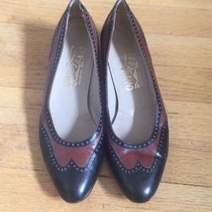 Wing tip Ferragamo flats